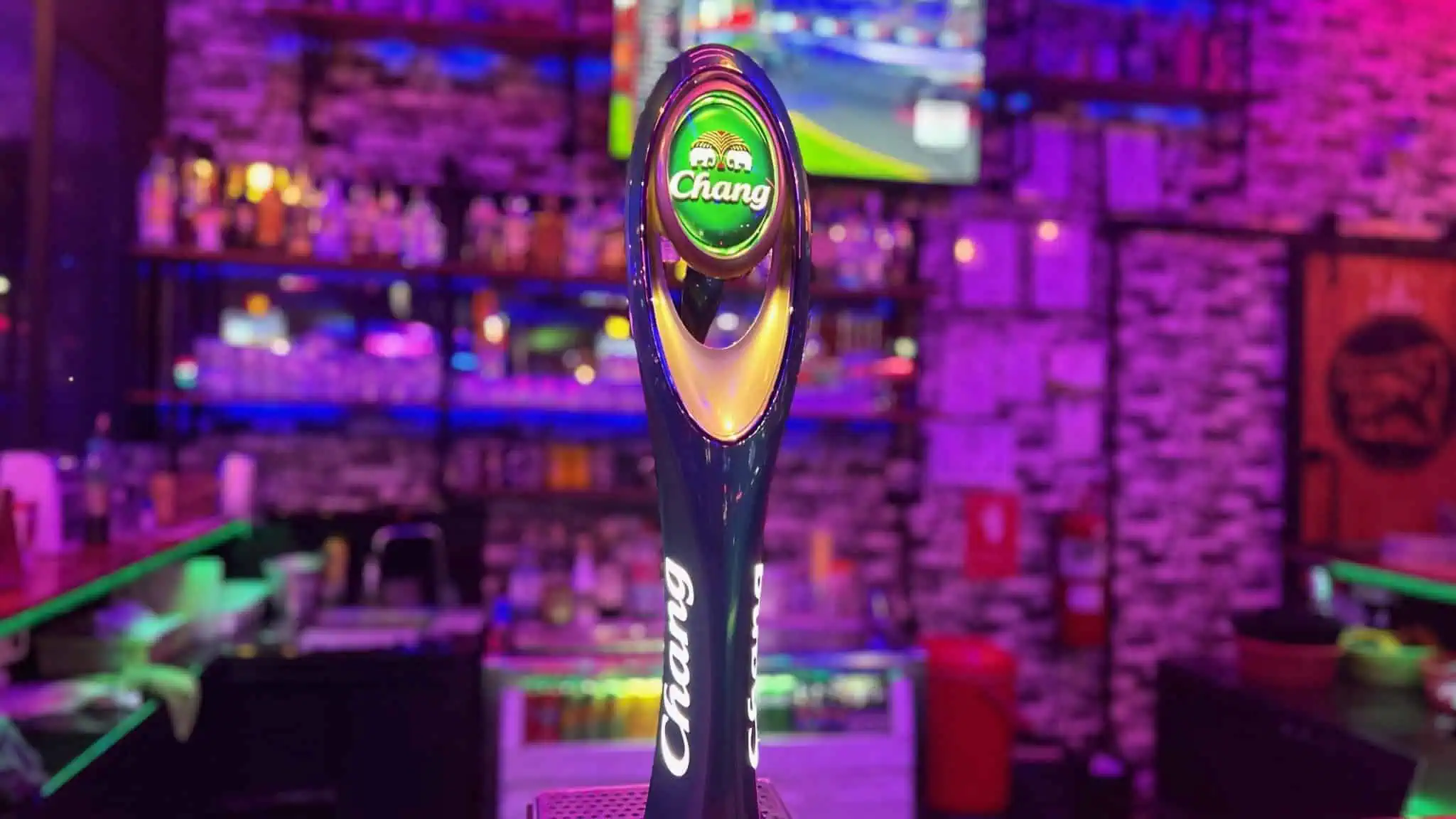 Chang beer tap handle at bar