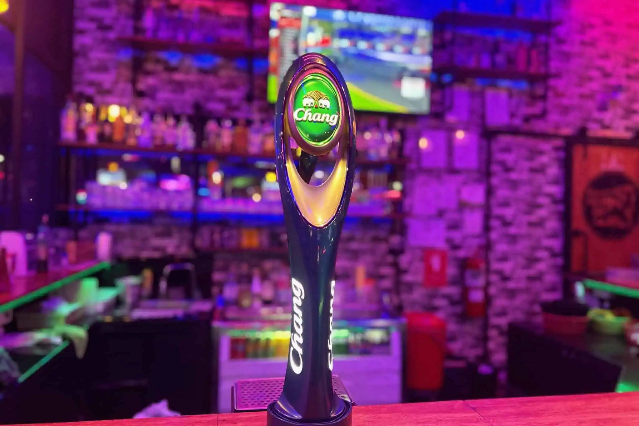 Chang beer tap handle at bar